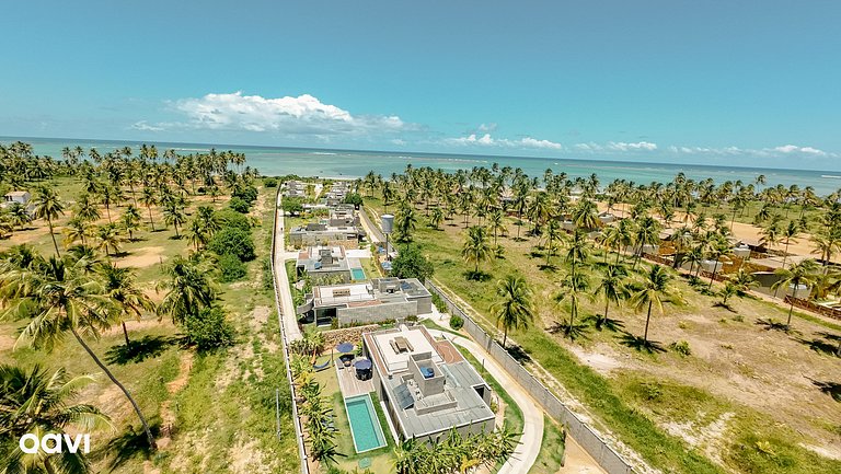Casa com Piscina na Praia de Tatuamunha by Qavi