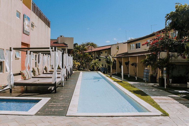 Qavi - Apartamento frente-piscina no Centro de Pipa #SolarÁg