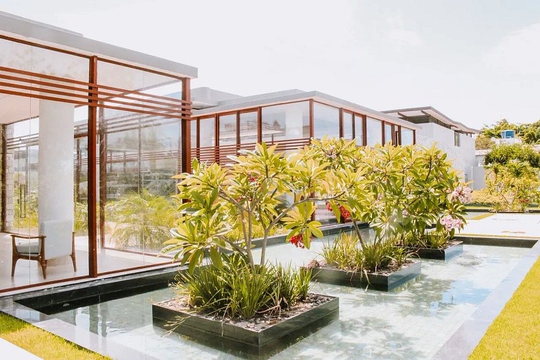 Qavi - Flat completo com dois quartos com varanda e jardim p